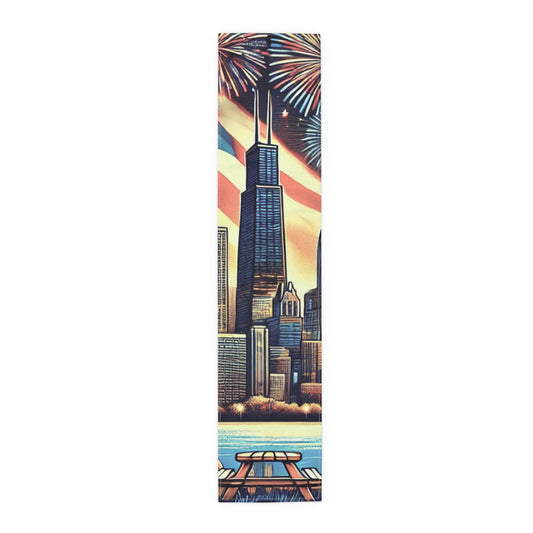 Vertical Chicago-themed table runner featuring a bold city skyline with tall buildings, an American flag backdrop, and colorful fireworks lighting up the sky. The bottom of the runner shows a picnic table and water, adding a festive outdoor element perfect for patriotic celebrations and Vegas-themed events.