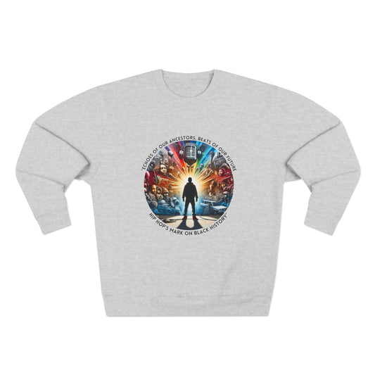 Gray sweatshirt featuring a circular design with a silhouetted figure standing in front of a vibrant collage of hip hop elements, including microphones, turntables, graffiti, and speakers. Surrounding the design is the text: 'Echoes of Our Ancestors, Beats of Our Future – Hip Hop’s Mark on Black History.