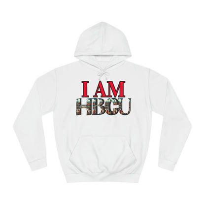 "White hoodie featuring bold red text that reads 'I AM' above large letters spelling 'HBCU,' filled with a vibrant collage of HBCU imagery, including graduates and historic campus scenes