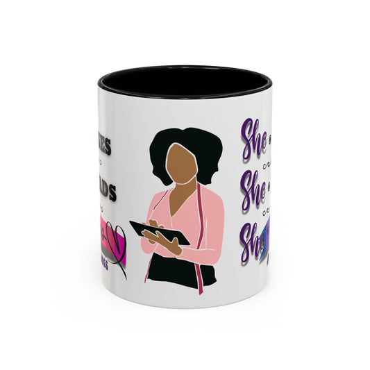 A white ceramic coffee mug with a glossy finish, featuring an illustration of a woman and text that empowerment and strength.