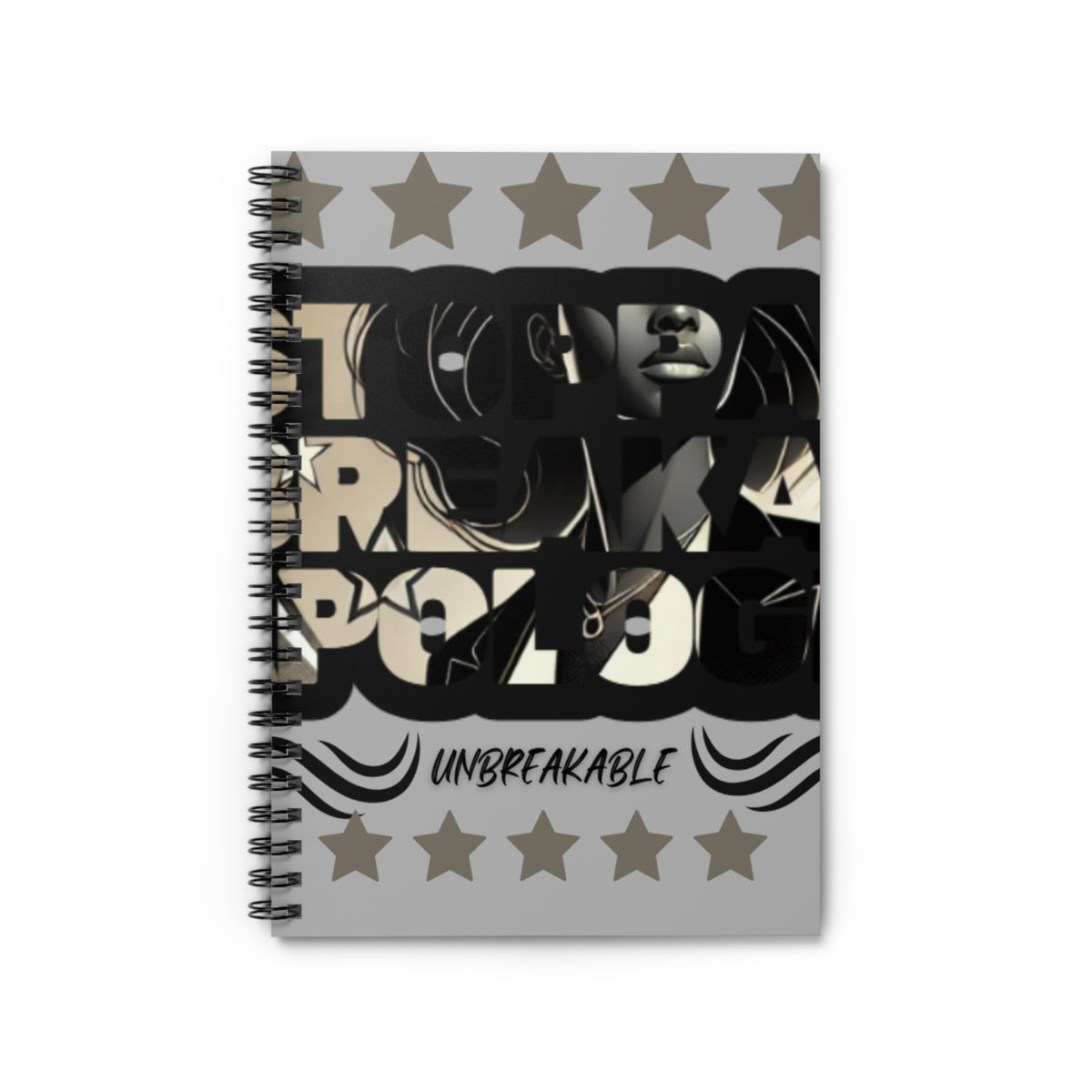 A spiral notebook with a cover featuring a graphic design with stars and the words 'UNBREAKABLE'.