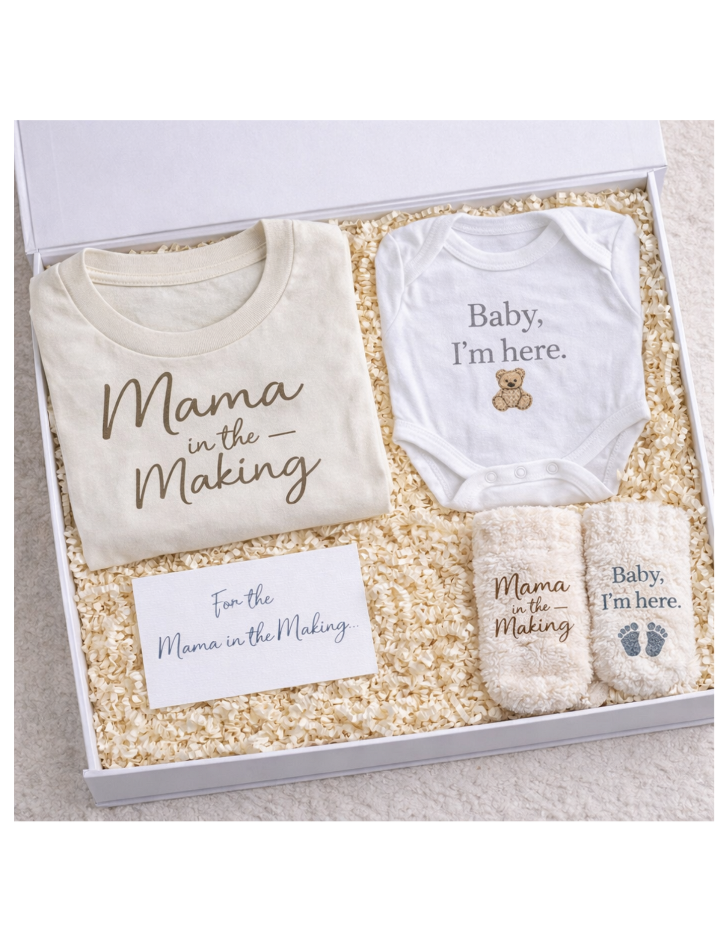 Gift set for a new mother with 'Mama in the Making' shirt, onesie, and booties.