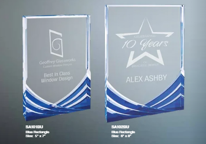 Two elegant blue rectangle crystal plaques with personalized engravings for corporate recognition, featuring etched award titles and recipient names.